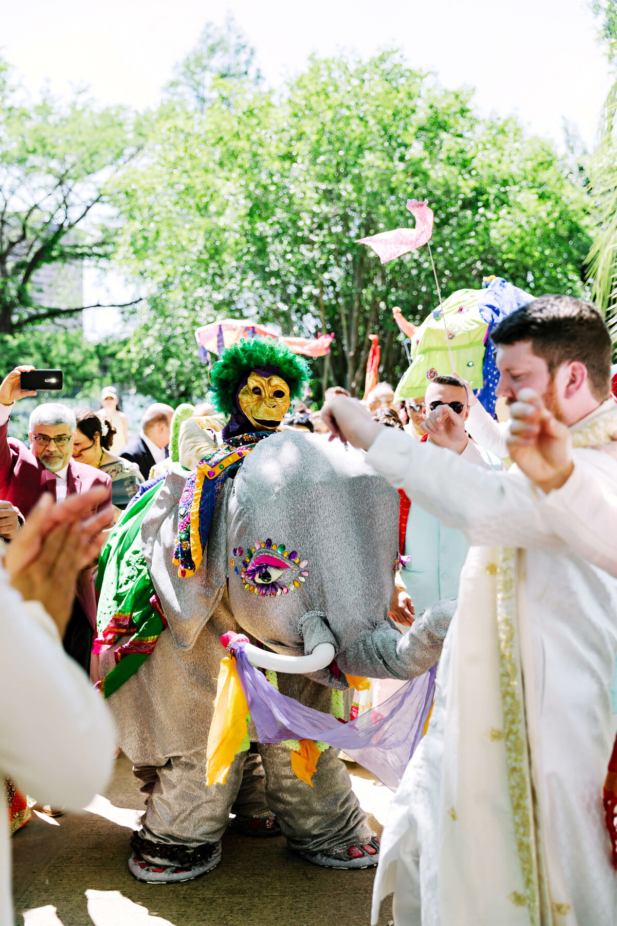 colorful baraat at multicultural wedding