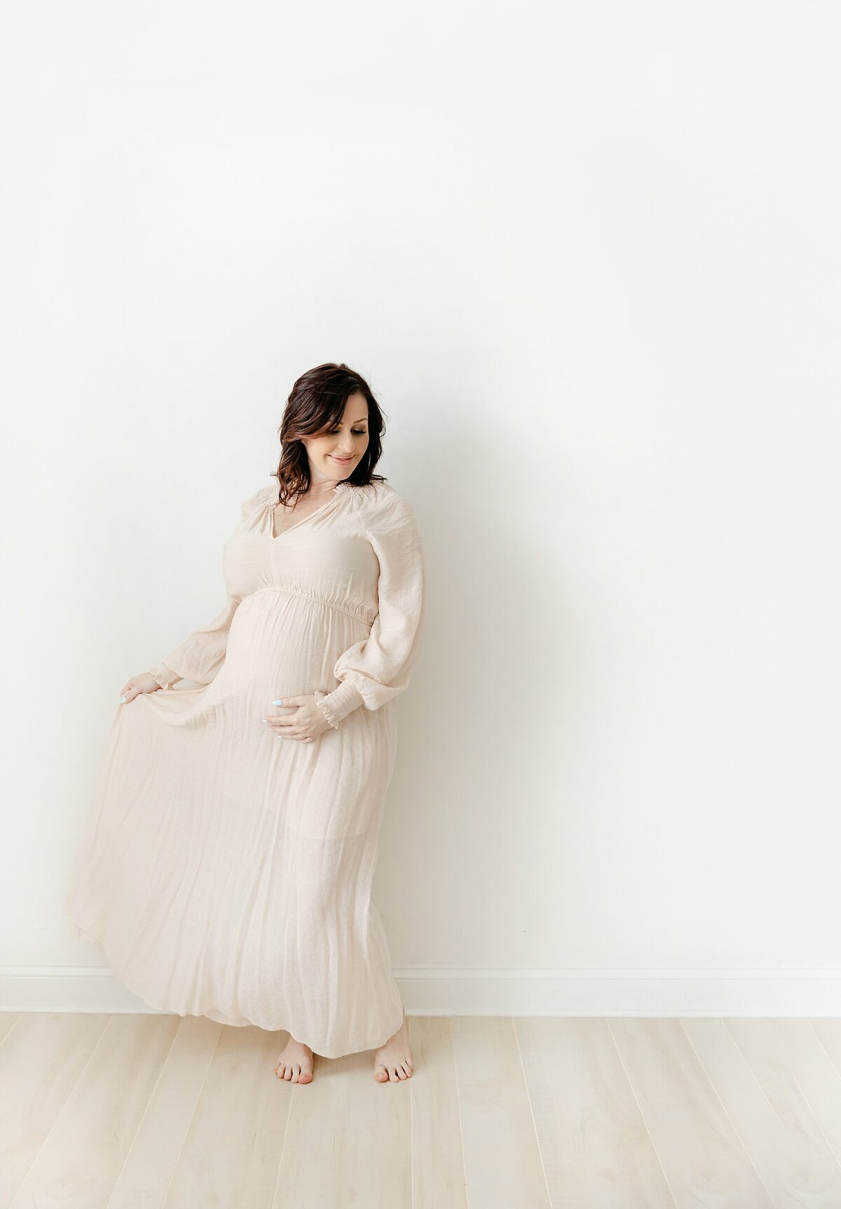 expectant mom twirling dress 