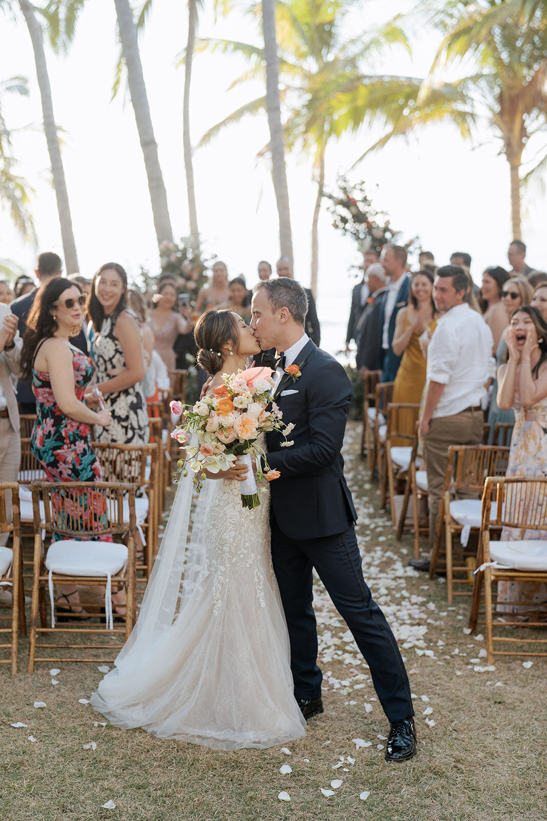 Ceremony kiss at ACRE Resort Cabo Mexico