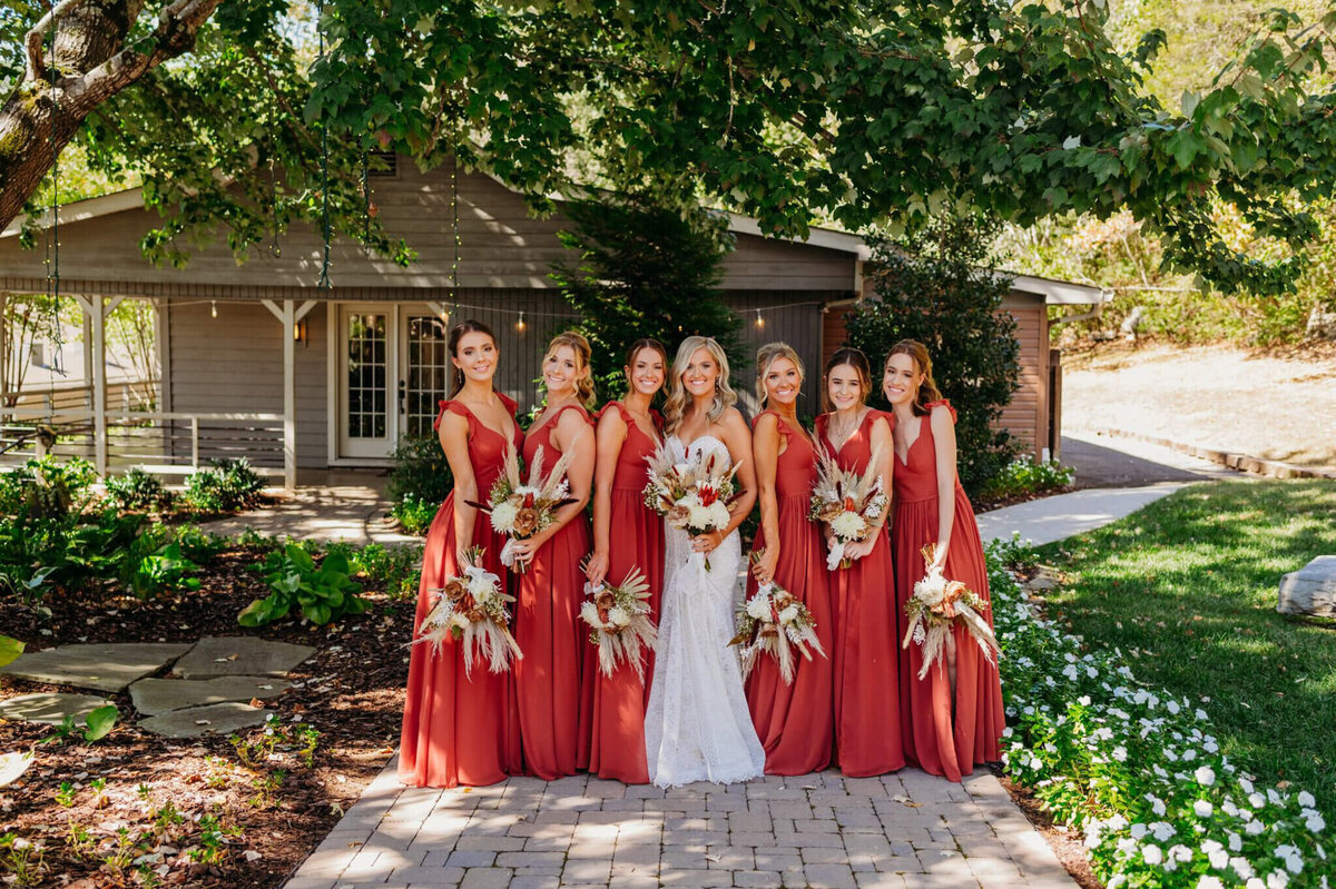 photo of a bride posed with her bridesmaids at The Venue Chattanooga