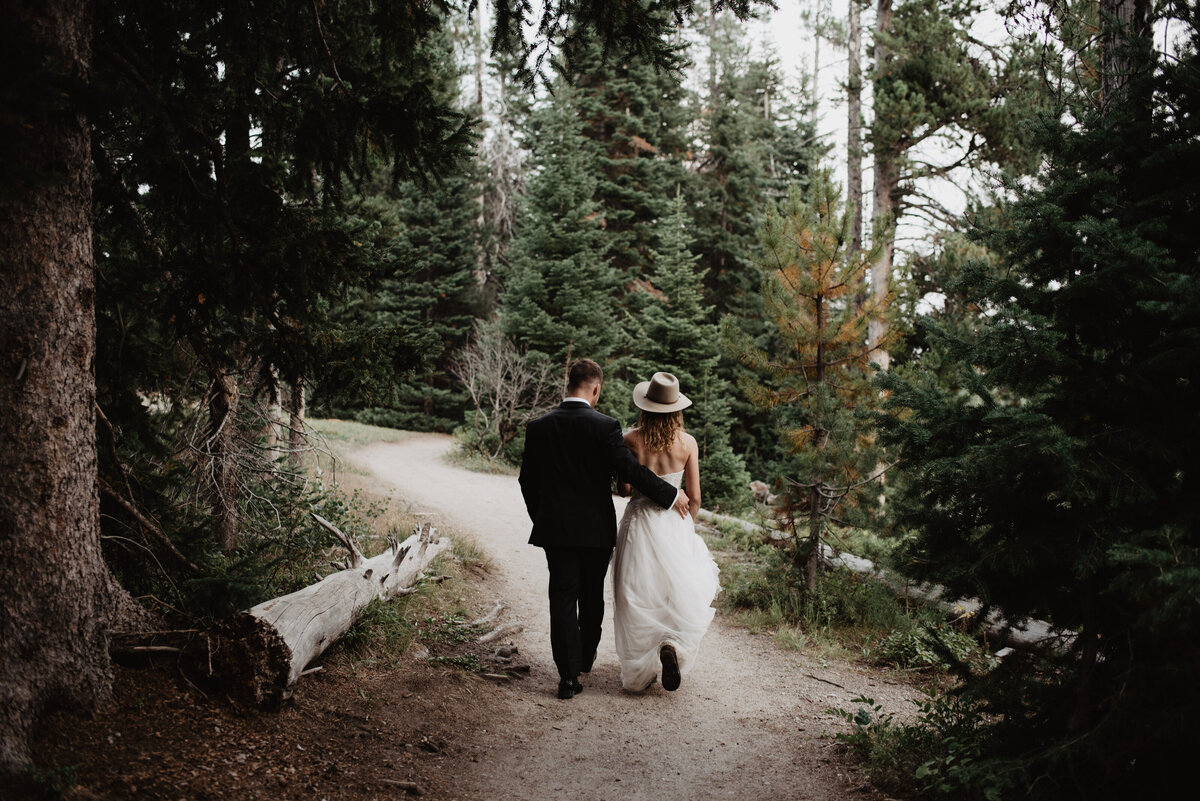 Jackson Hole Photographers capture couple walking through forest