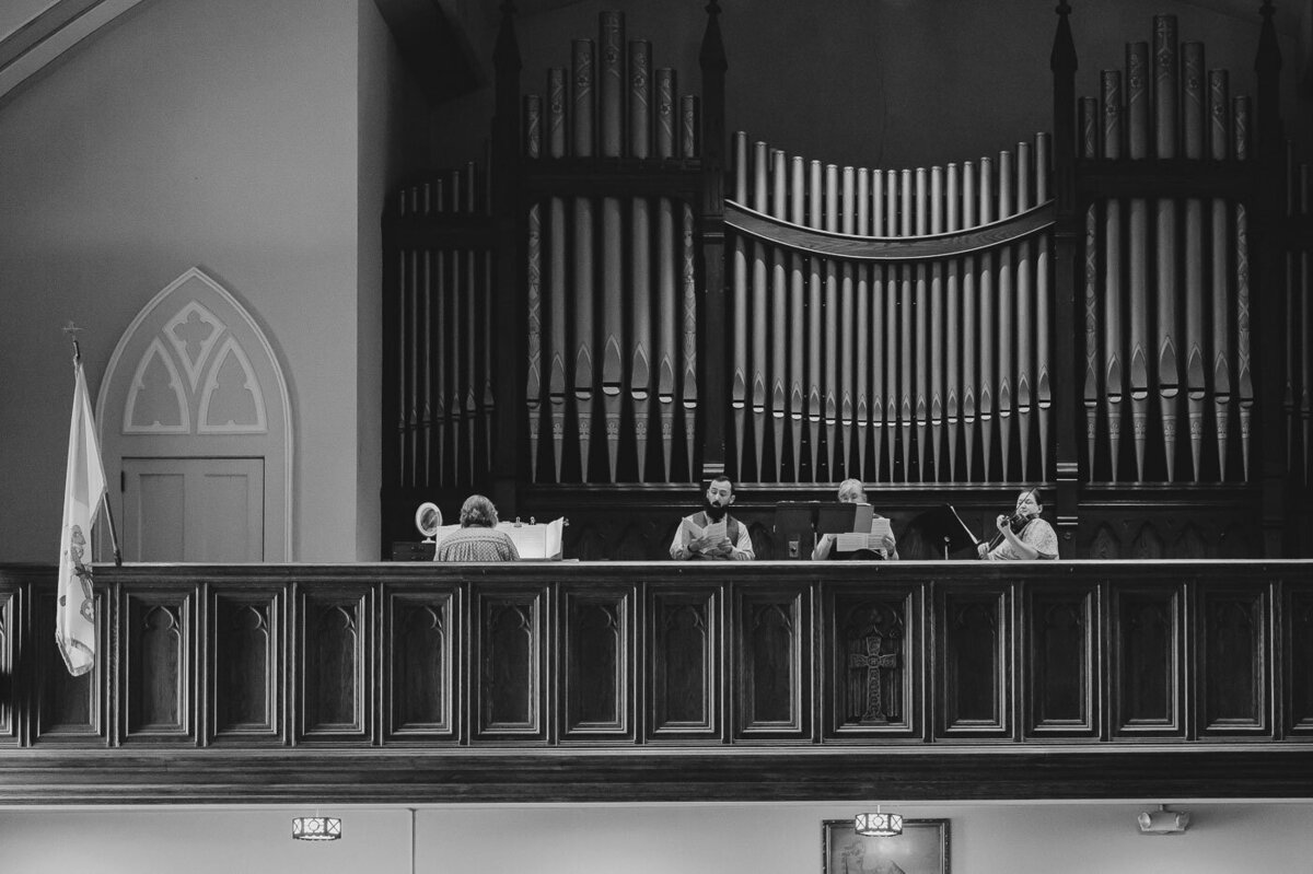 musicians playing at a church wedding