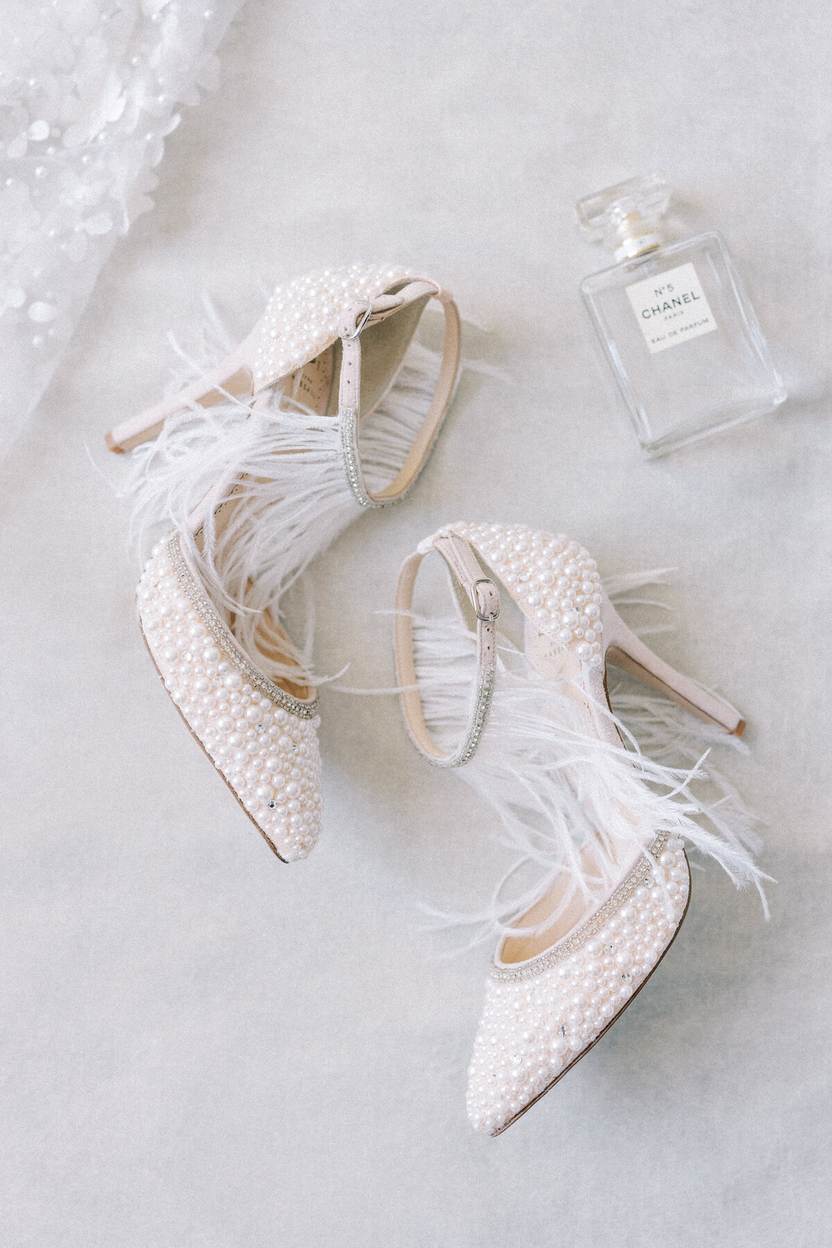 pearl wedding shoes with feathers by Bella Belle shoes