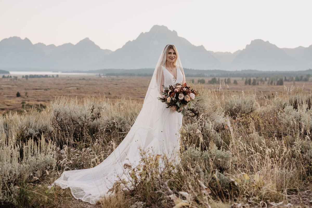 Photographers Jackson Hole capture bride holding bouquet