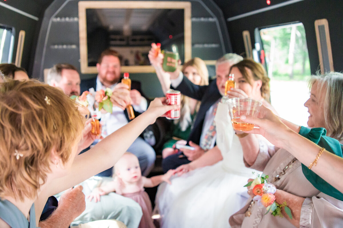 Jackson Hole photographers capture wedding party celebrating after mountain elopement