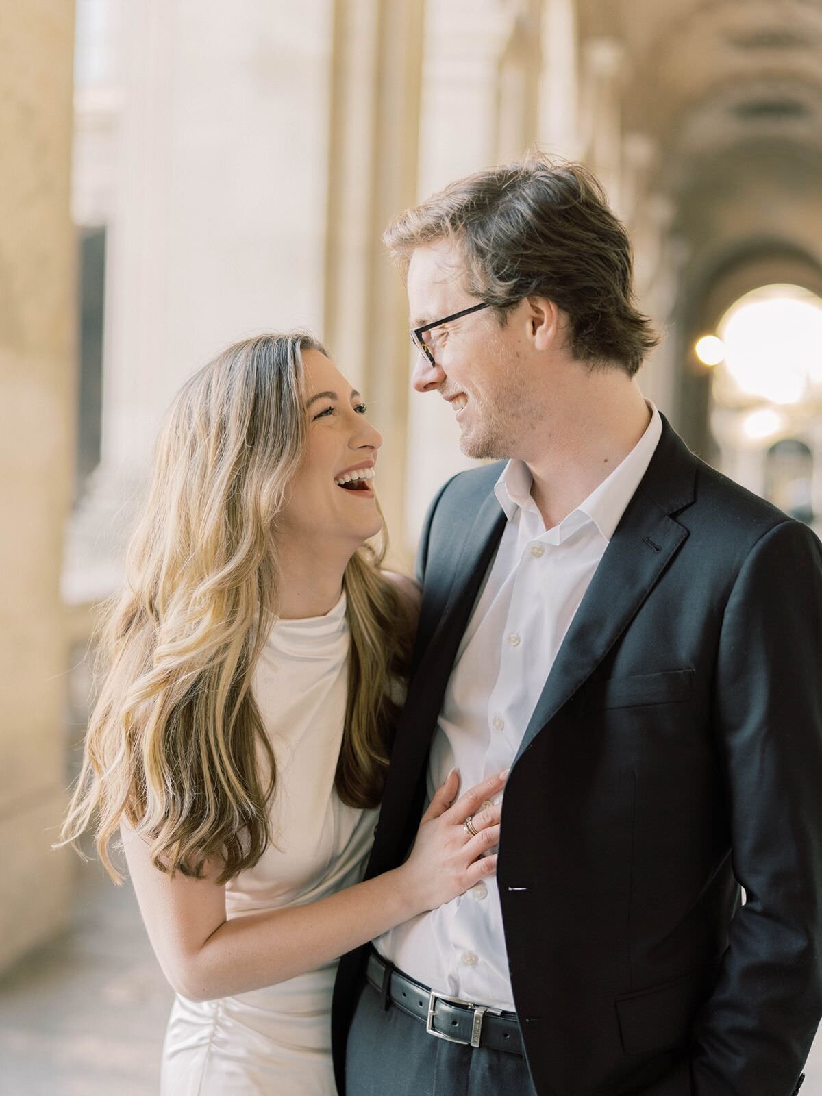 couple-at-engagement-session-at-the-louvre-with-sarah-sunstrom-photography