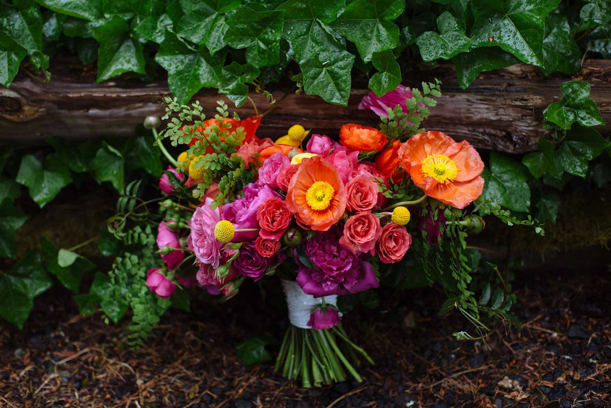Cheerful Indian wedding filled with color, orange poppies, peonies, ranunculus and maidenhair fern.