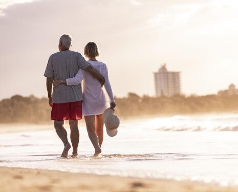 B-by-Halcyon-Beach-Walking-Couple-Arm-in-Arm