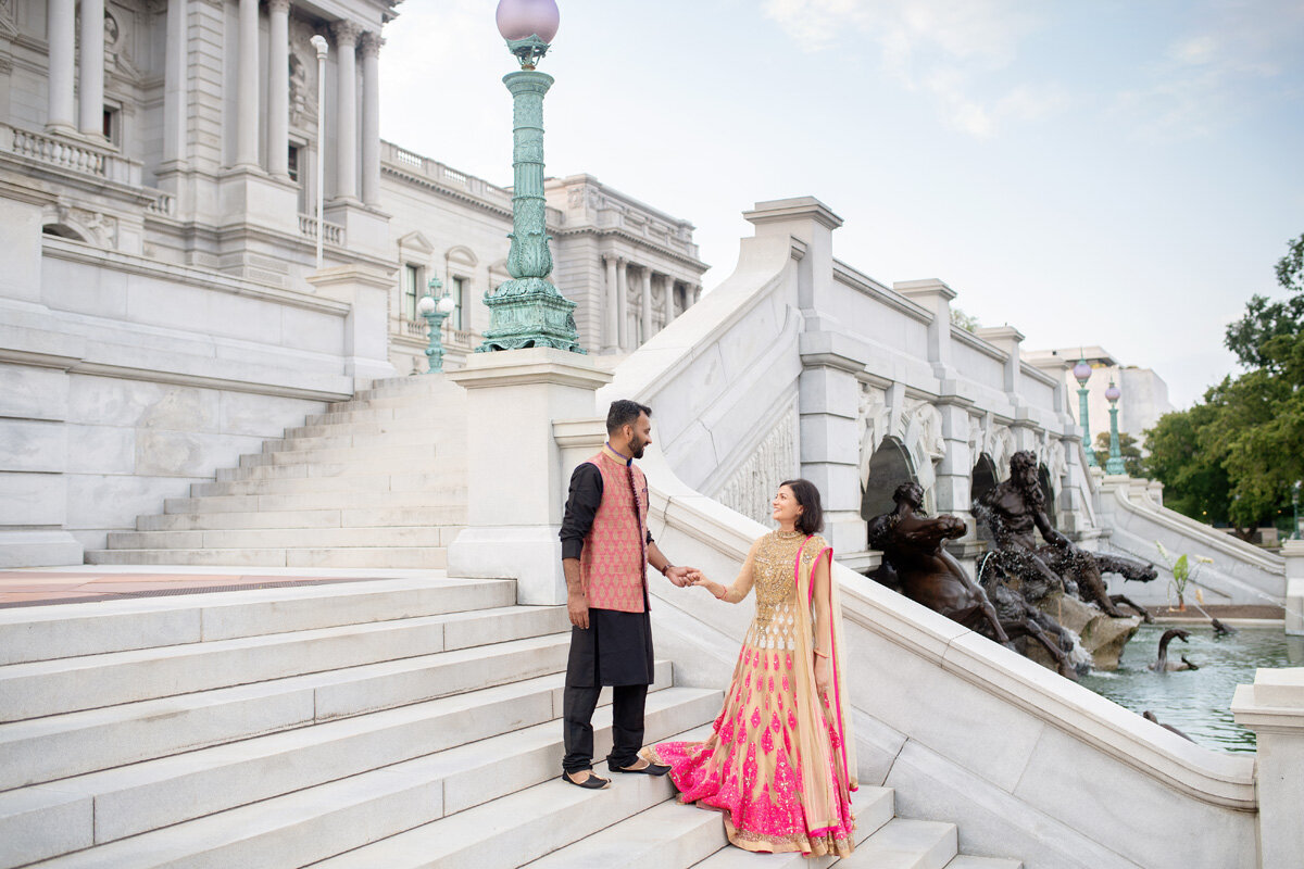 Family session of couple standing on the steps in DC