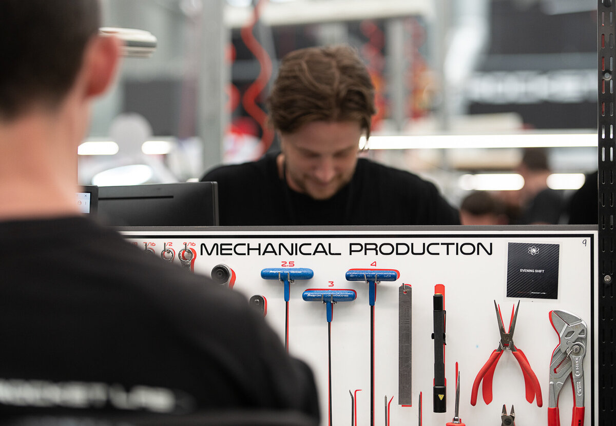 Rocket lab's Auckland Production Centre. Engineering team at work on bench. Detail