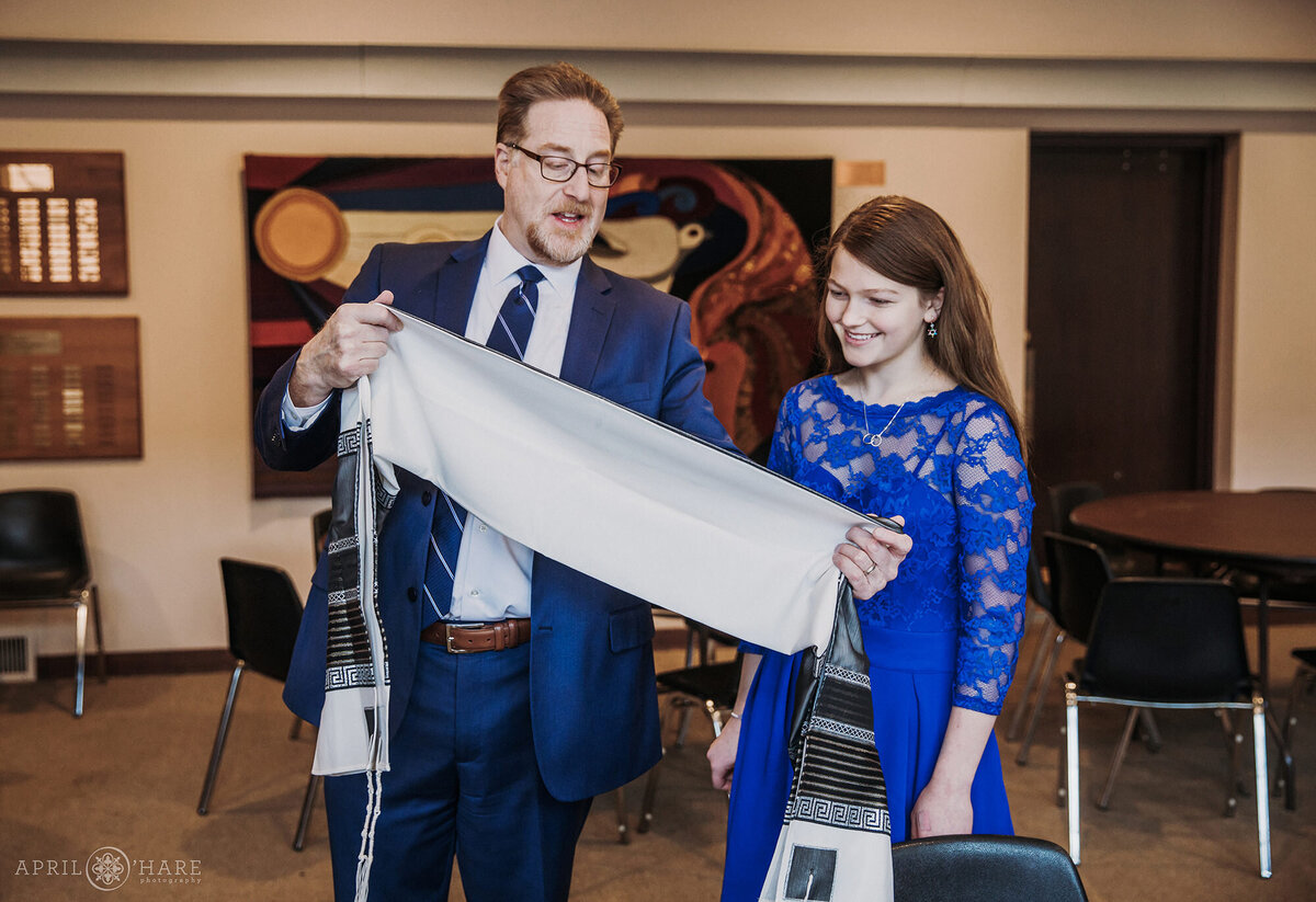 Cantor and Bat Mitzvah Child Look at the Tallit at Temple Emanuel in Denver CO