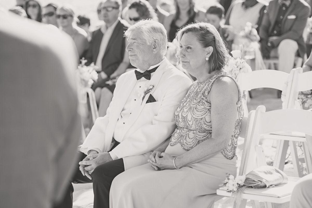 Parents looking at the wedding ceremony