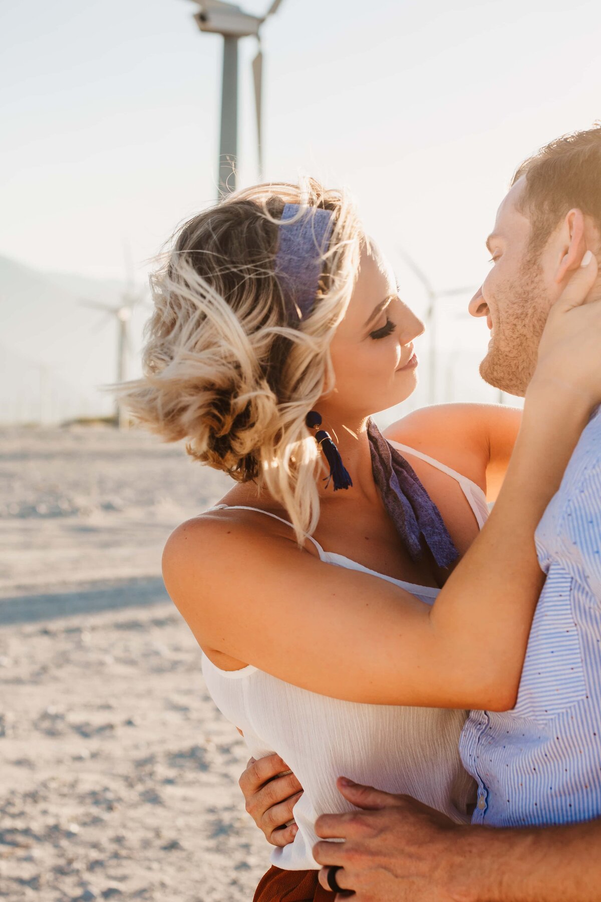 couple-palm-springs-wind-turbines-engagement-shoot