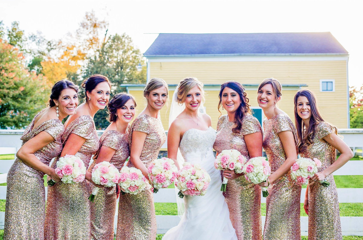 Bride and Bridesmaids in gold sequin  dresses on  wedding day