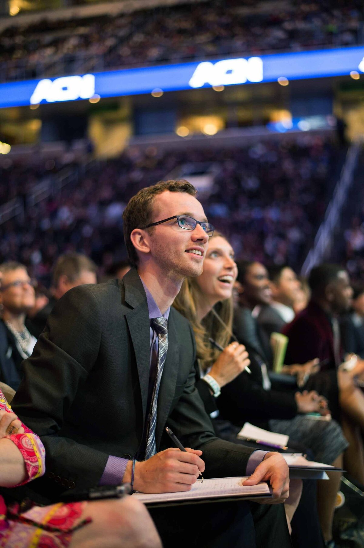 Intrigued and awe struck audience members  at ACN conference in San Jose SAP Arena