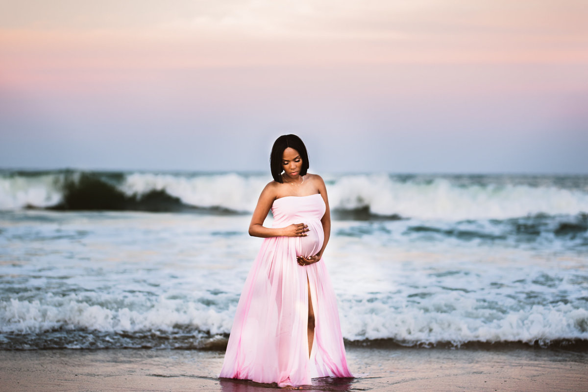 Virginia Beach, Virginia Maternity Session taken by Crystal Cofie Photography with a Pink Maternity dress
