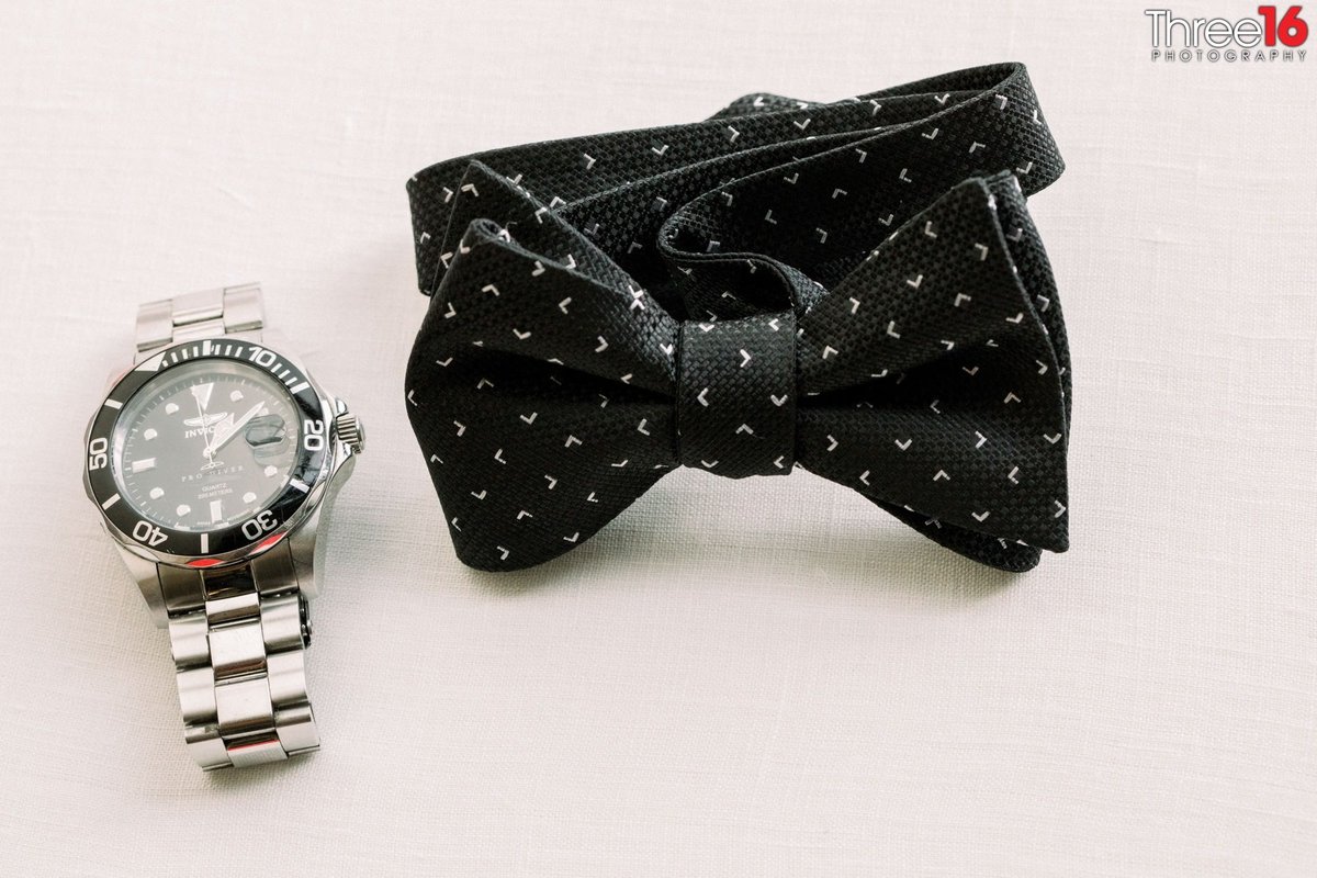 Grooms wedding day bow tie and watch