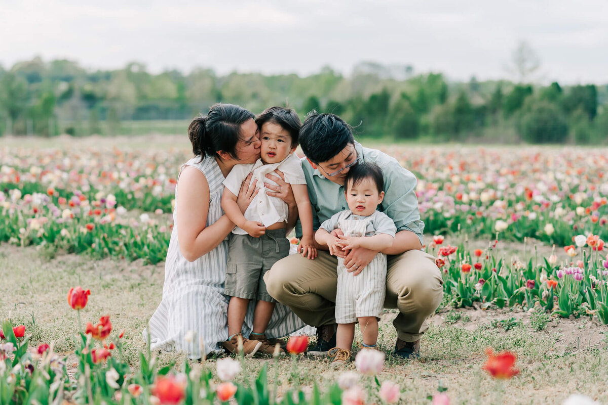 A family of four enjoying their family session by Denise Van Photography in Northern VA