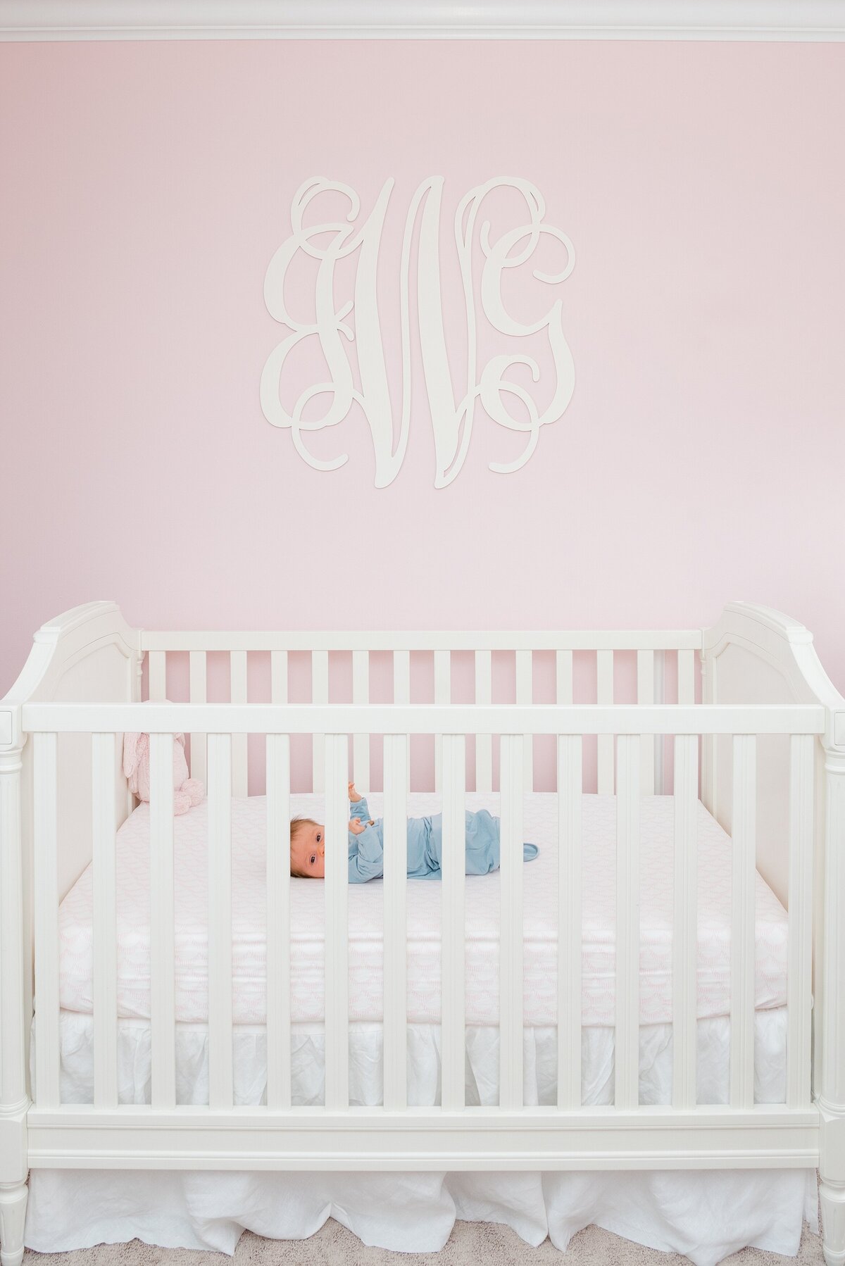 98_newborn-girl-laying-in-pink-nursery_doylestown-pa-