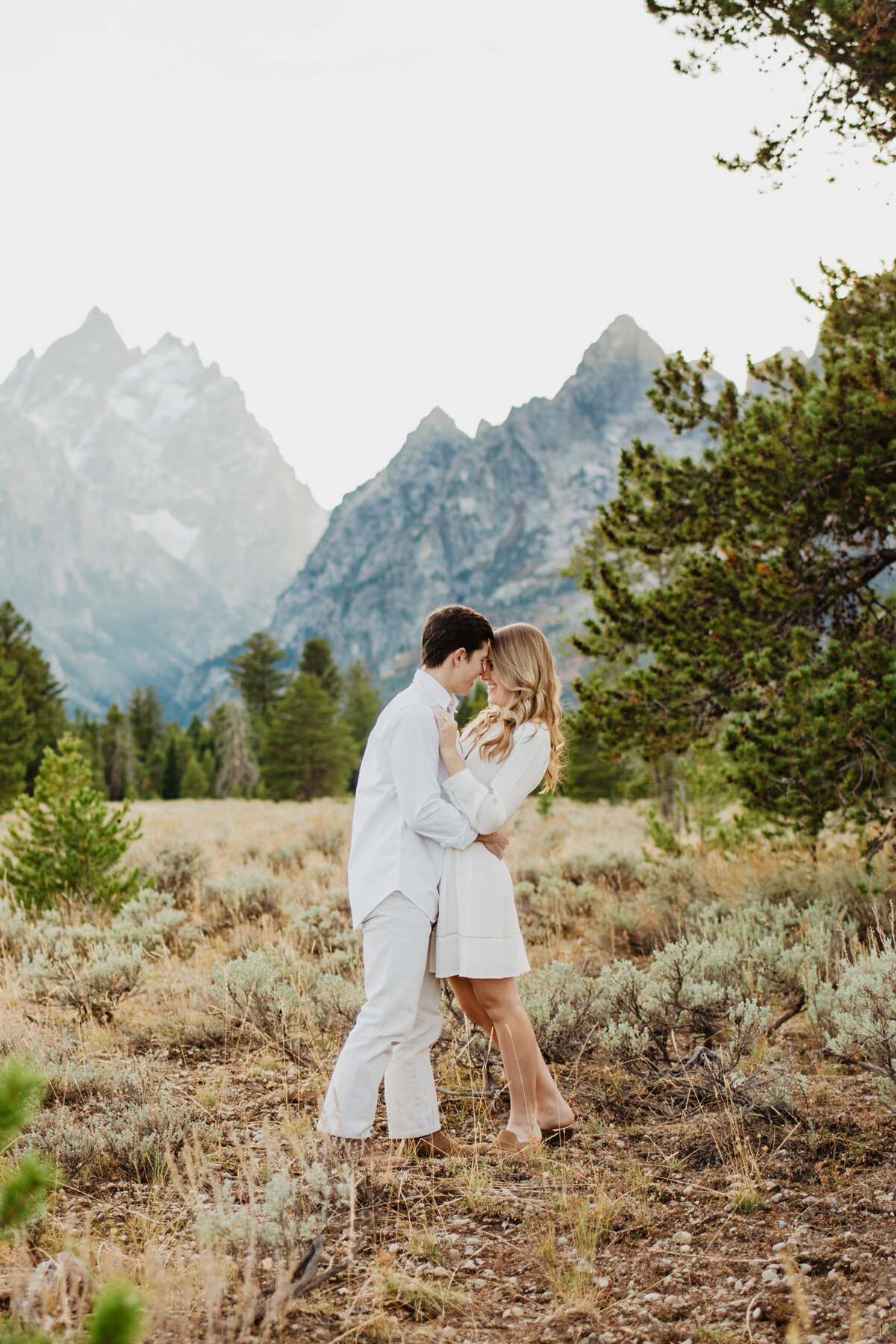 Photographers Jackson Hole capture outdoor portraits in front of Tetons