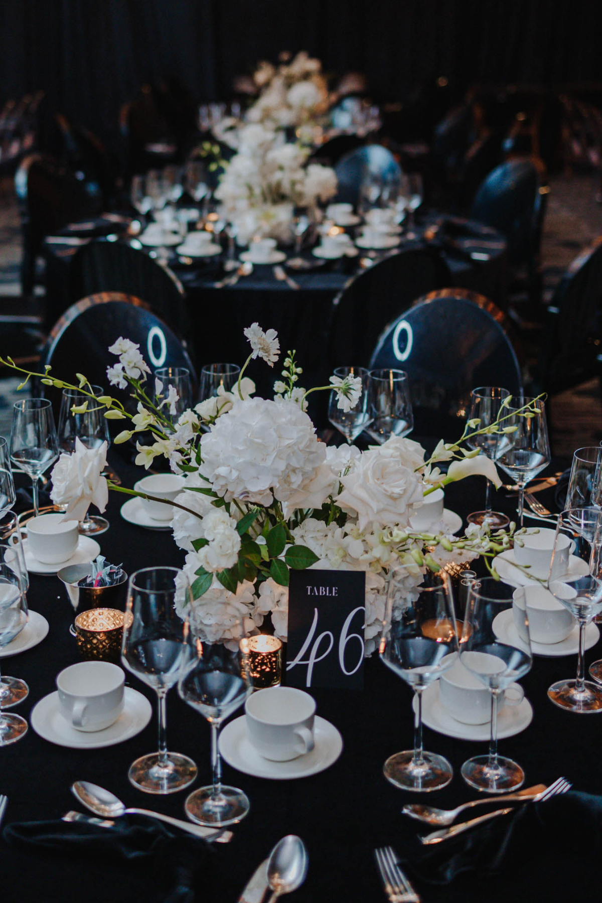 black-white-wedding-reception-flowers-centerpieces-candles