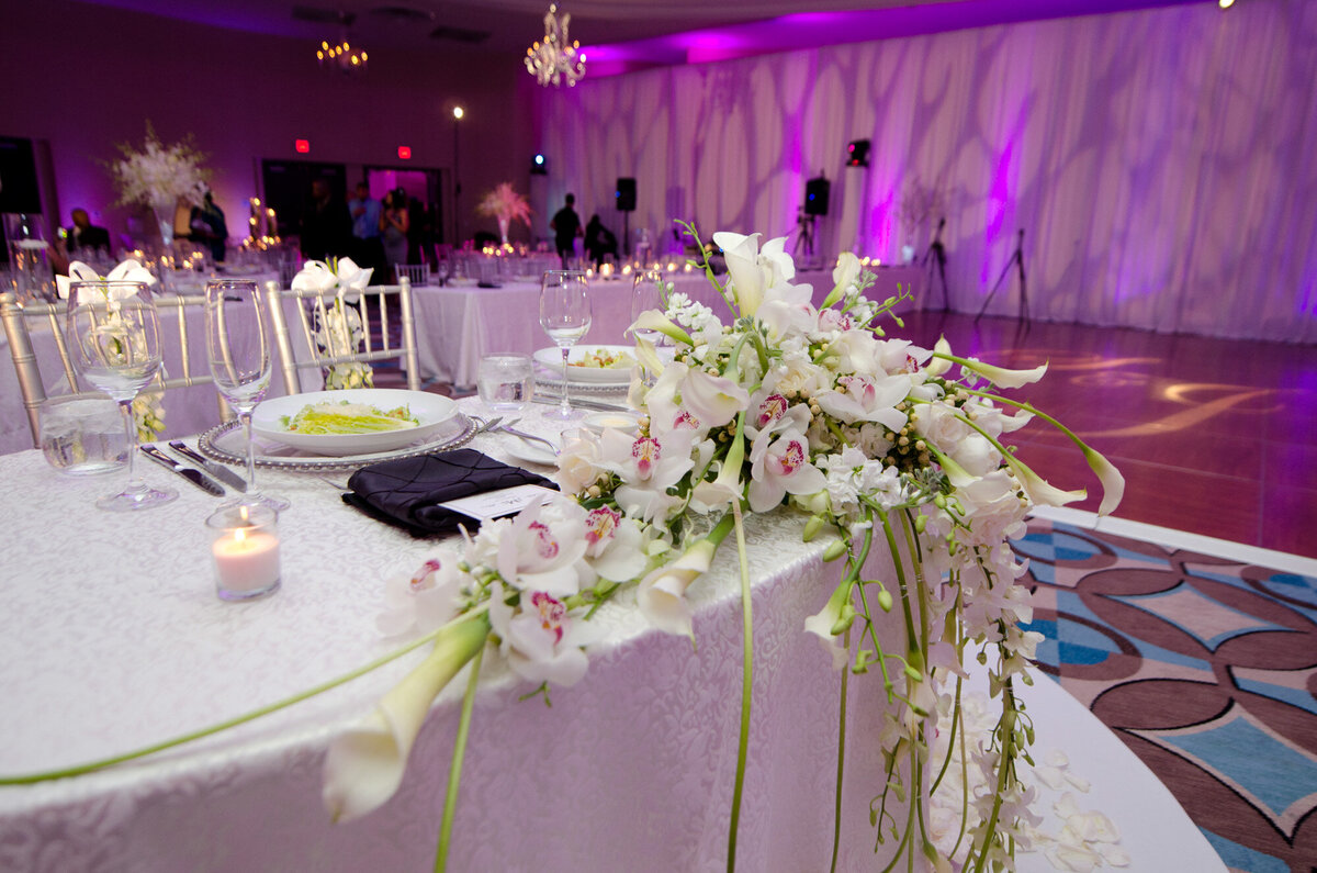 Floral details for a wedding reception table