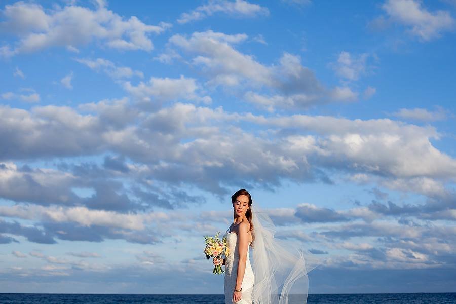 bride with blue sky backdrop