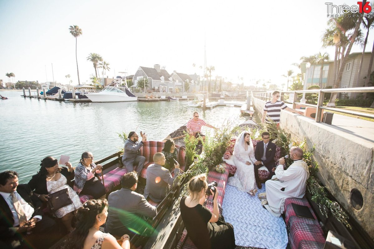 Wedding ceremony on a Gondola Getaway in Long Beach takes place