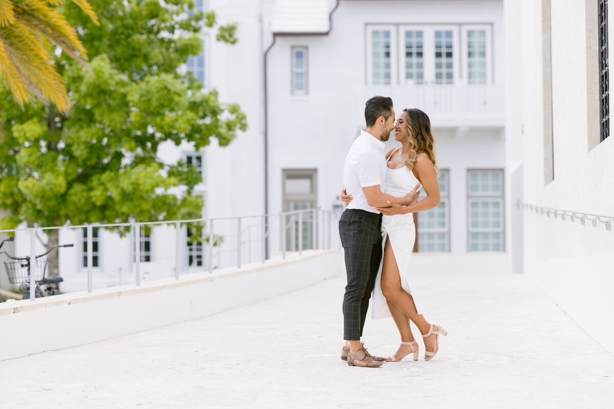 A couple hugging and about to kiss