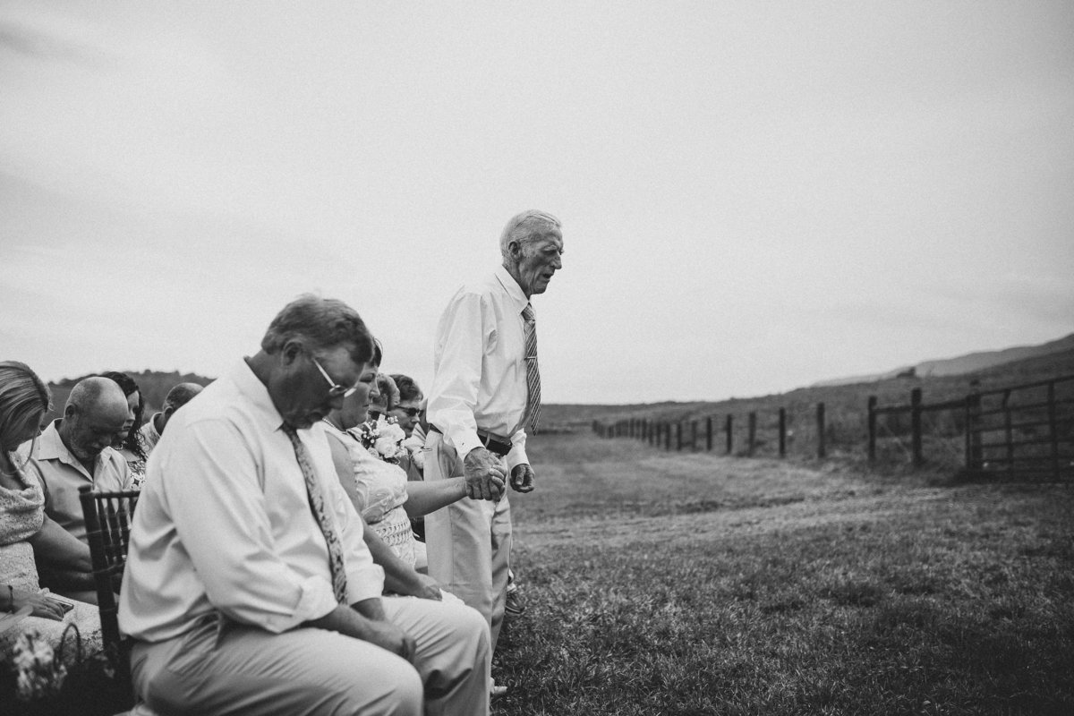 grandfather-praying-farm-wedding