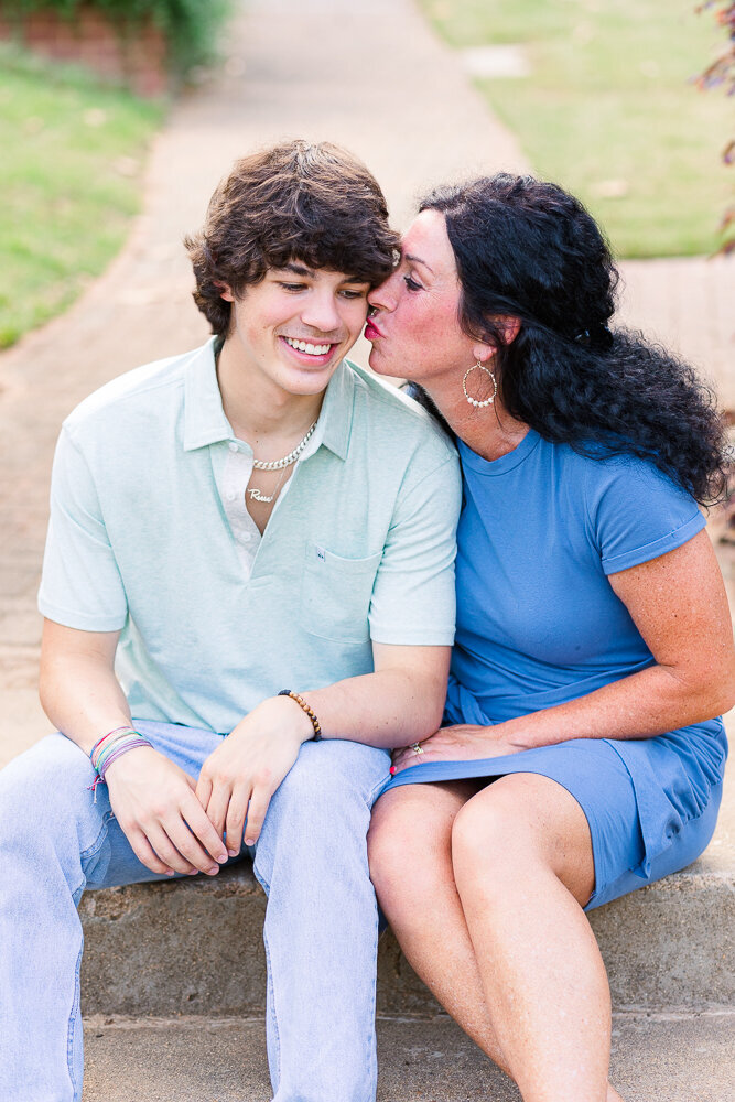 Candid precious moment of mother and son captured by Raleigh Family Photographer, Helen Hill.