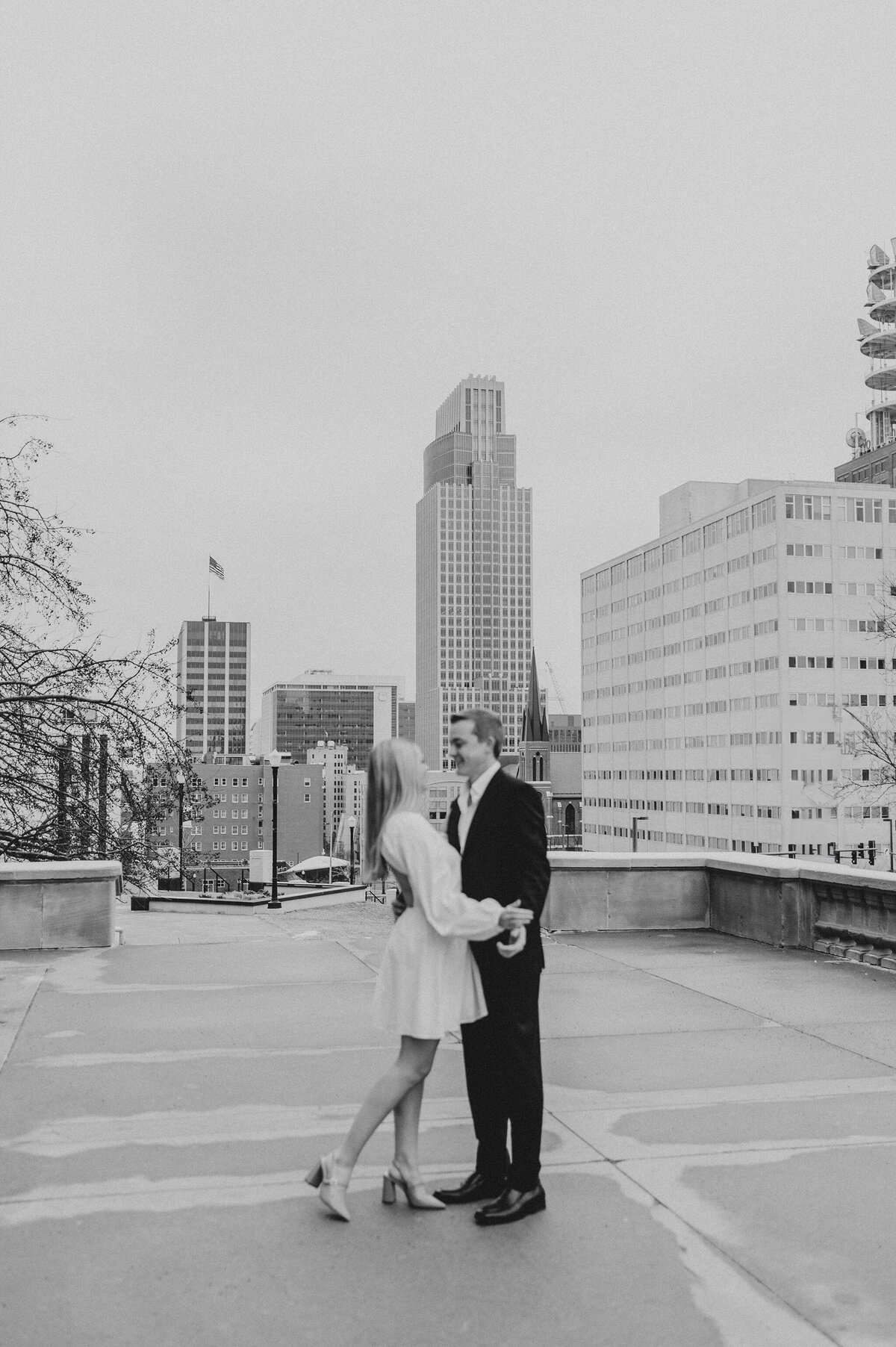 engagement session with a city view in downtown omaha