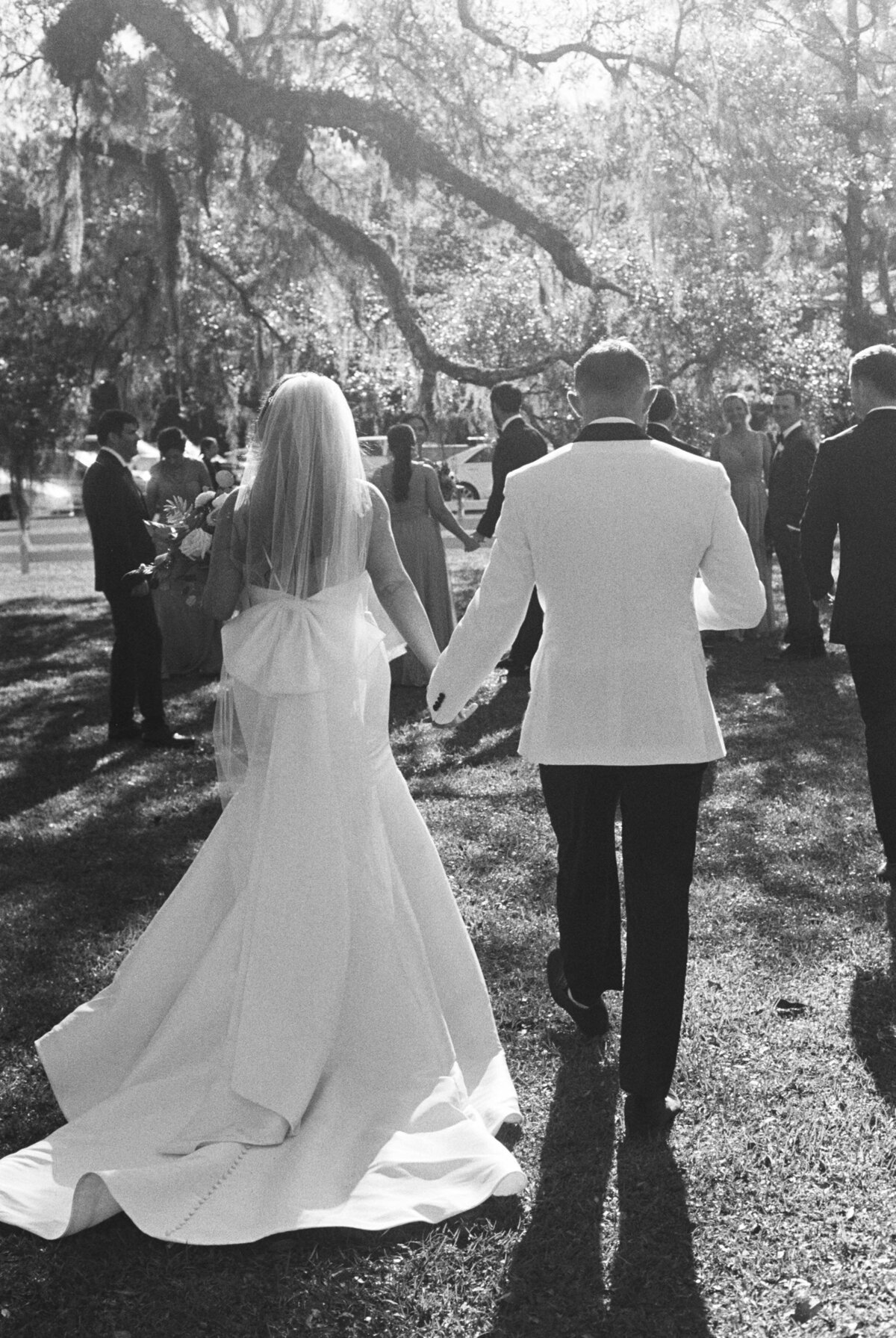 bride-groom-walk-with-bridal-party-charleston-467