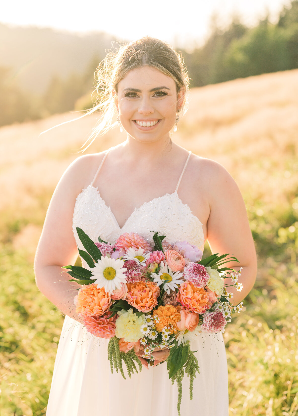 A blonde bride on Roan Mountain for her bridal session enjoying her North Carolina wedding photography