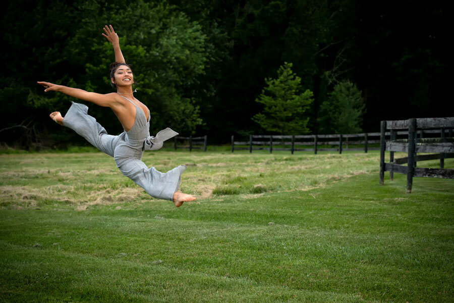 dancer leaping in portrait park