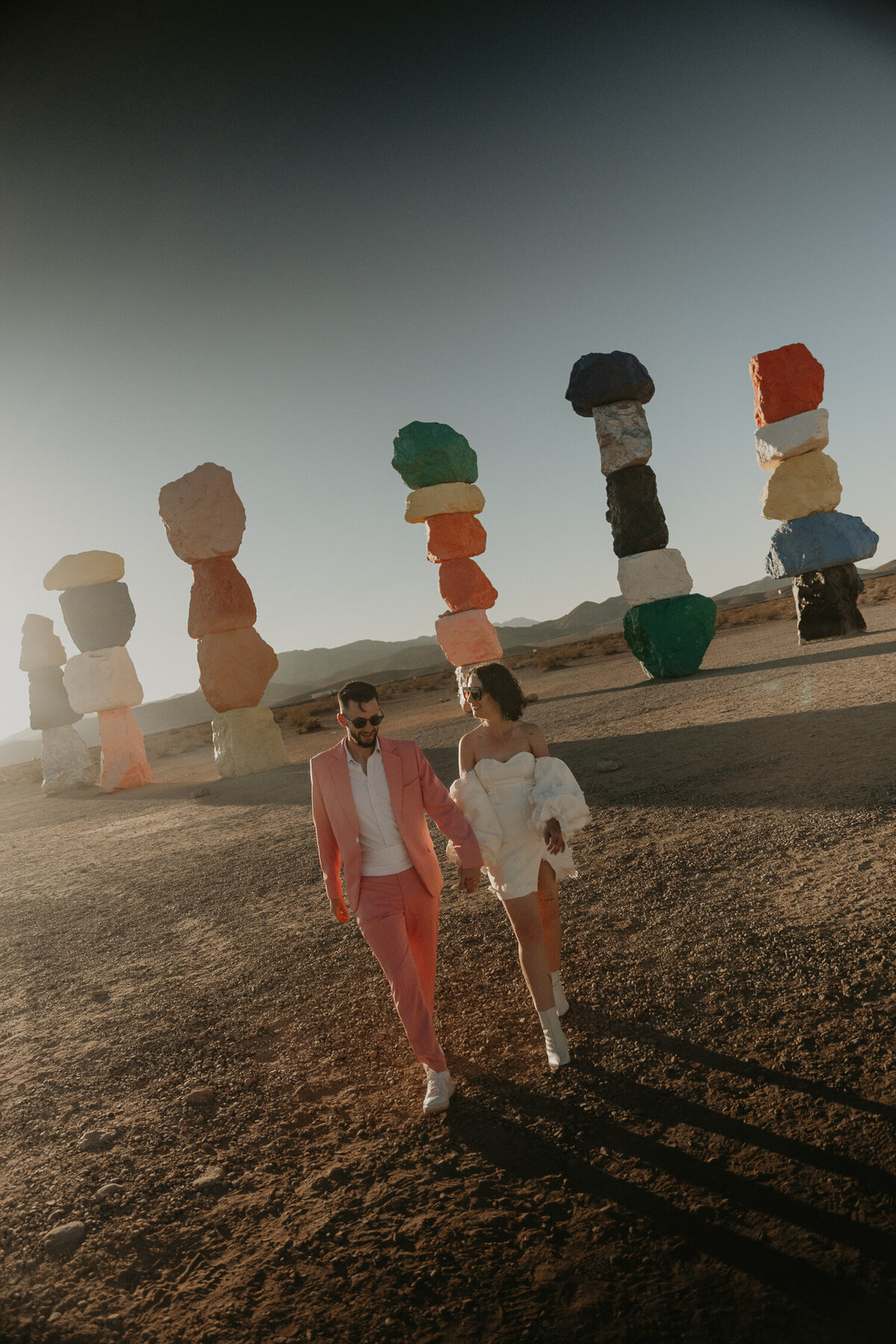 Bride and Groom sunset portraits at the Seven Magic Mountains in Las Vegas. 