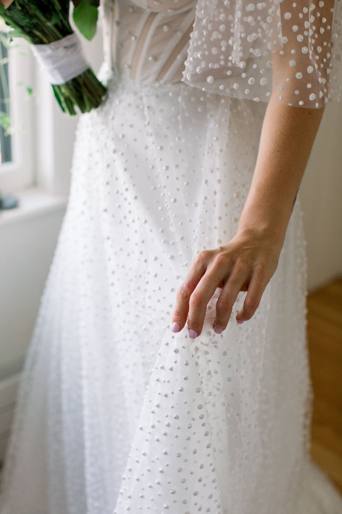 Pearl covered wedding gown with flutter sleeves