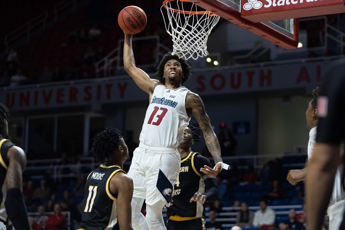 Javon Franklin dunks the ball against Southern Miss in the MItchell Center in Mobile, Alabama.