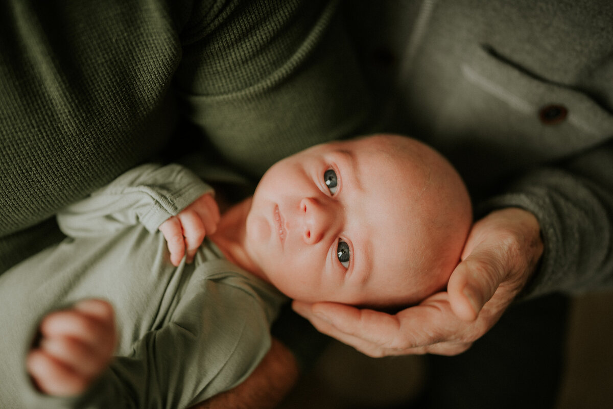 Welcome your newborn with warmth and charm. Capture the essence of home sweet arrival with Shannon Kathleen Photography's newborn portraits in Minneapolis.