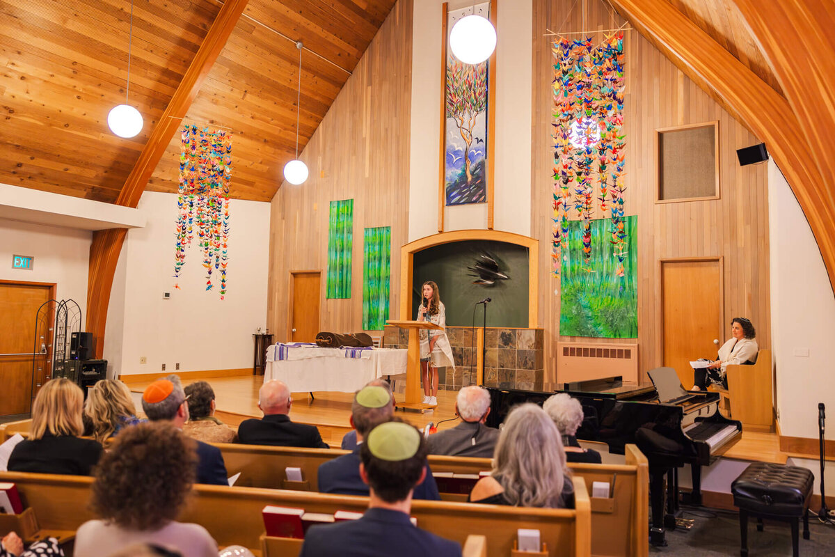 A view from the congregation inside a temple during a mitzvah speech