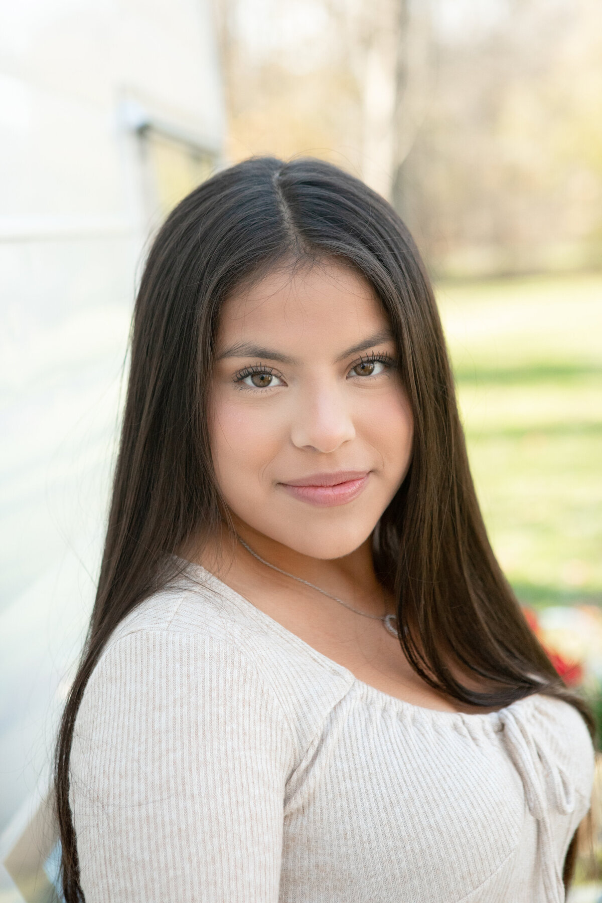 Latina teenage girl with long brown hair Nyack High School senior portrait photographer Milestone Images