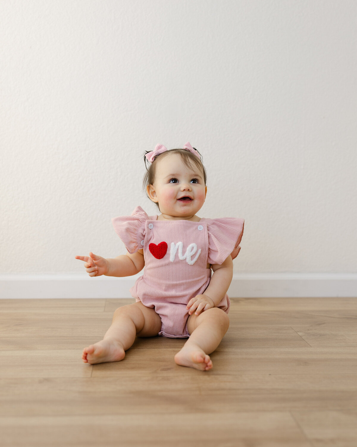 Dressed in pink and ready to celebrate this little one just turned ONE! Captured by Yucaipa cake smash photographer Kaitlyn Dawn Photography.