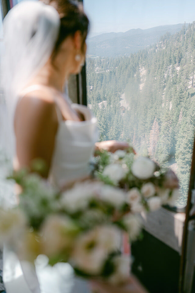 Bride looking out to Tahoe mountains