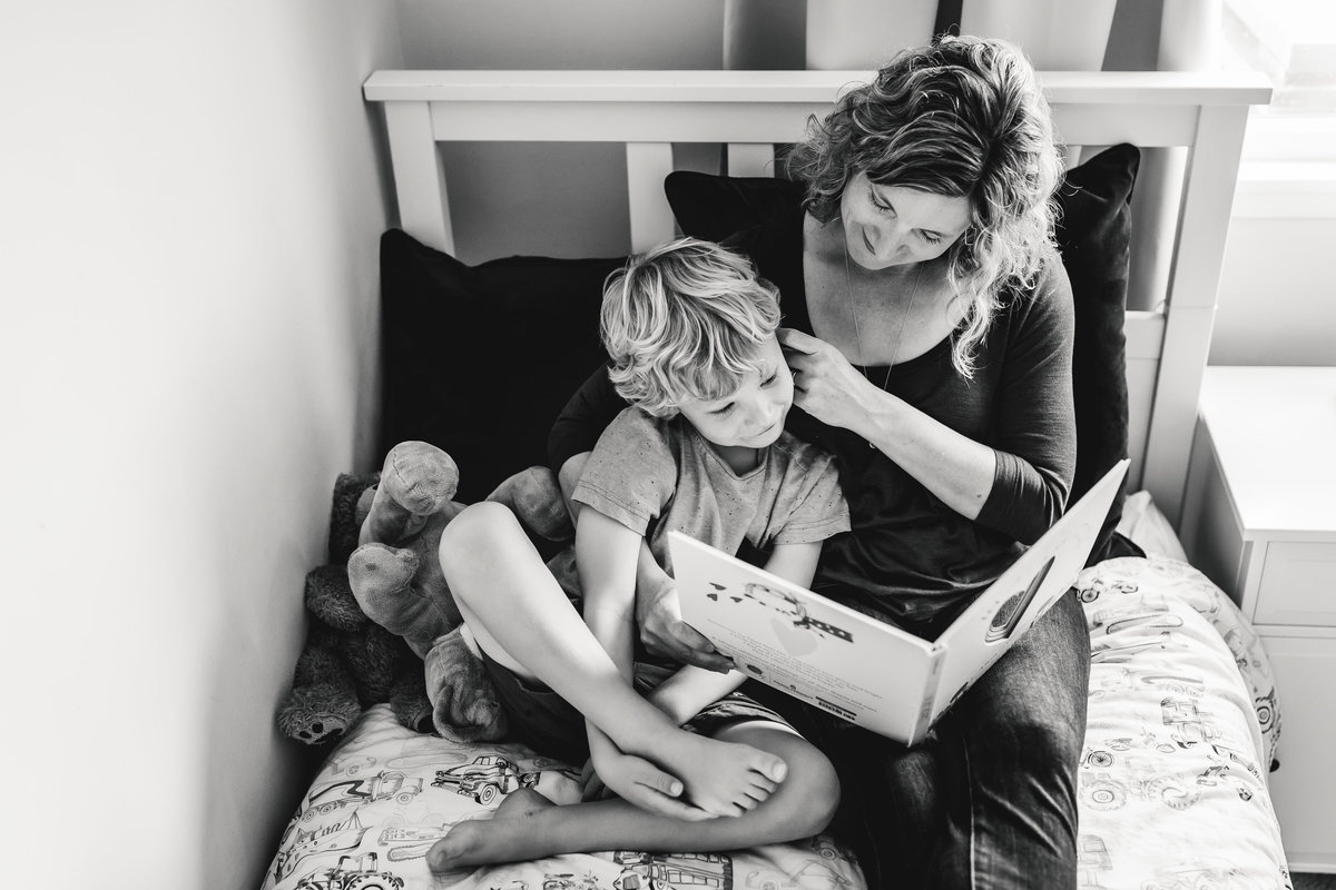 San Francisco Mom reads to child at in home family photography session