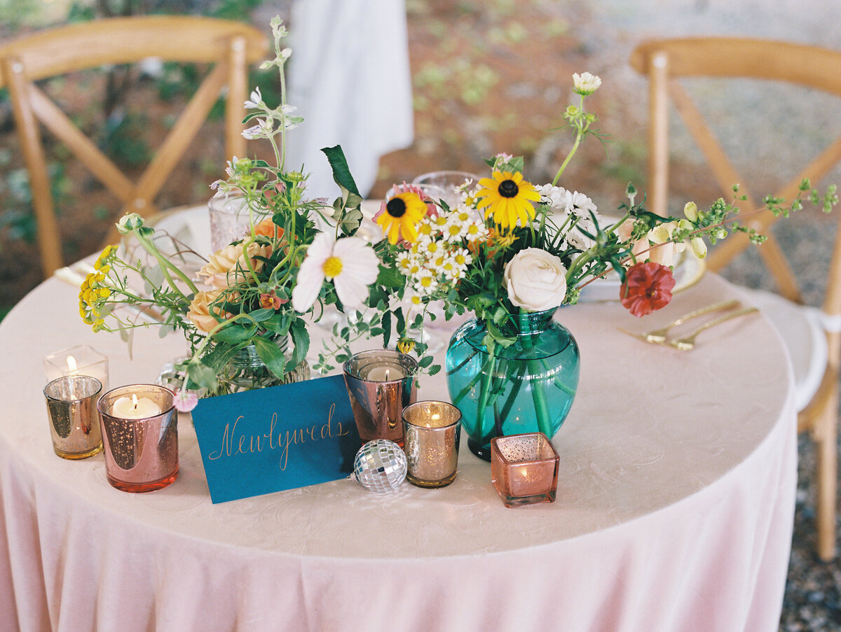 wedding table decor for A colorful private lakeside wedding in New Hampshire