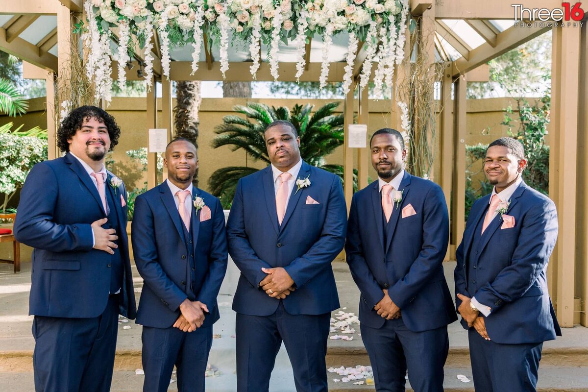 Groom and his Groomsmen pose for photos