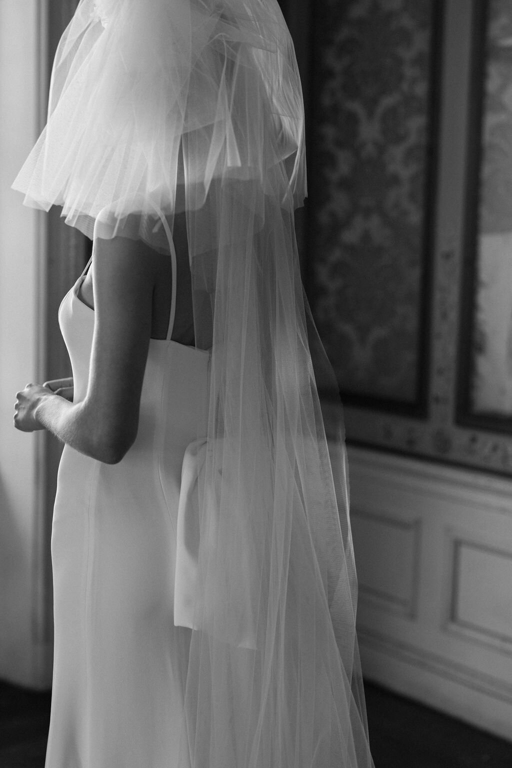 black and white view of back of wedding dress