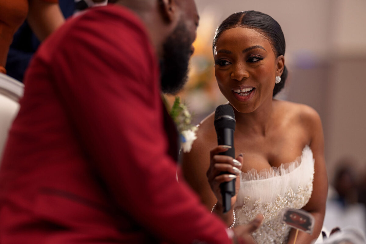 Tomi and Tolu Oruka Events Ziggy on the Lens photographer Wedding event planners Toronto planner African Nigerian Eyitayo Dada Dara Ayoola ottawa convention and event centre pocket flowers Navy blue groom suit ball gown black bride classy  295