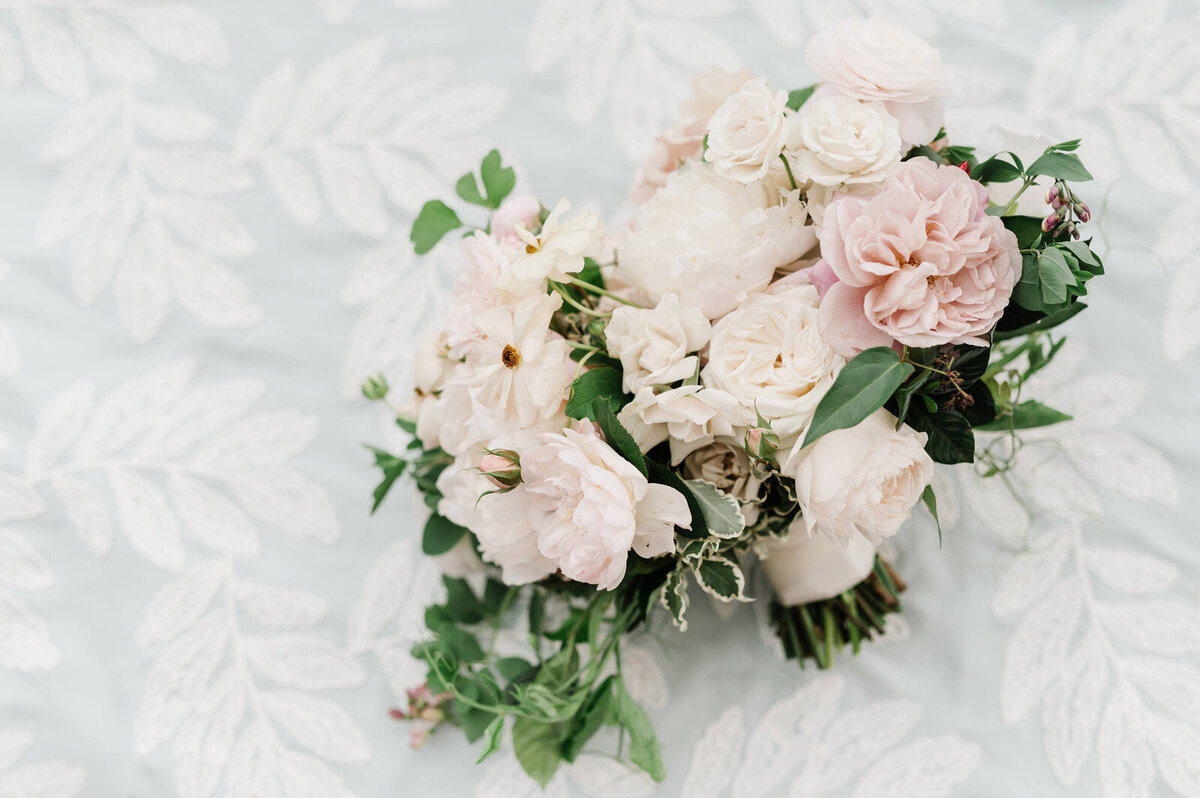 Kate-Murtaugh-Events-spring-floral-bouquet-blue-linen-Newport-RI-Castle-Hill-Inn-wedding-planner