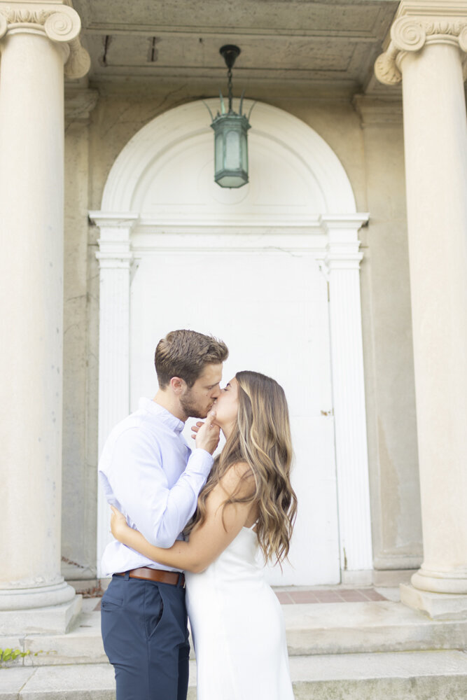 Harkness Park engagement portrait with couple kissing